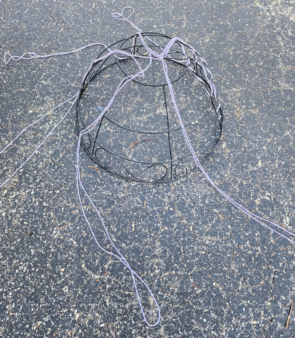 applyig twine to wire basket during design stage