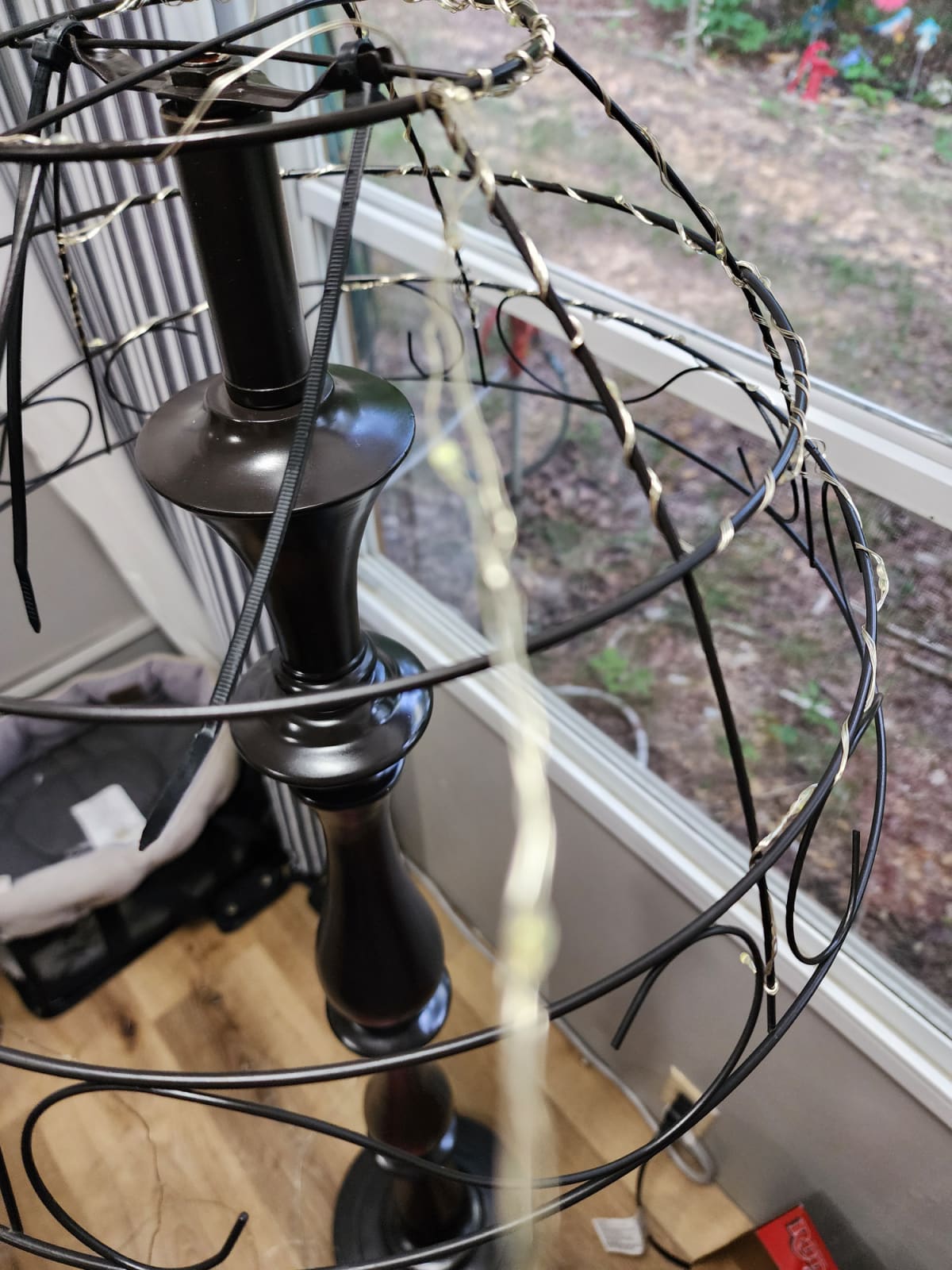 wrapping wire fairy lights around a lampshade