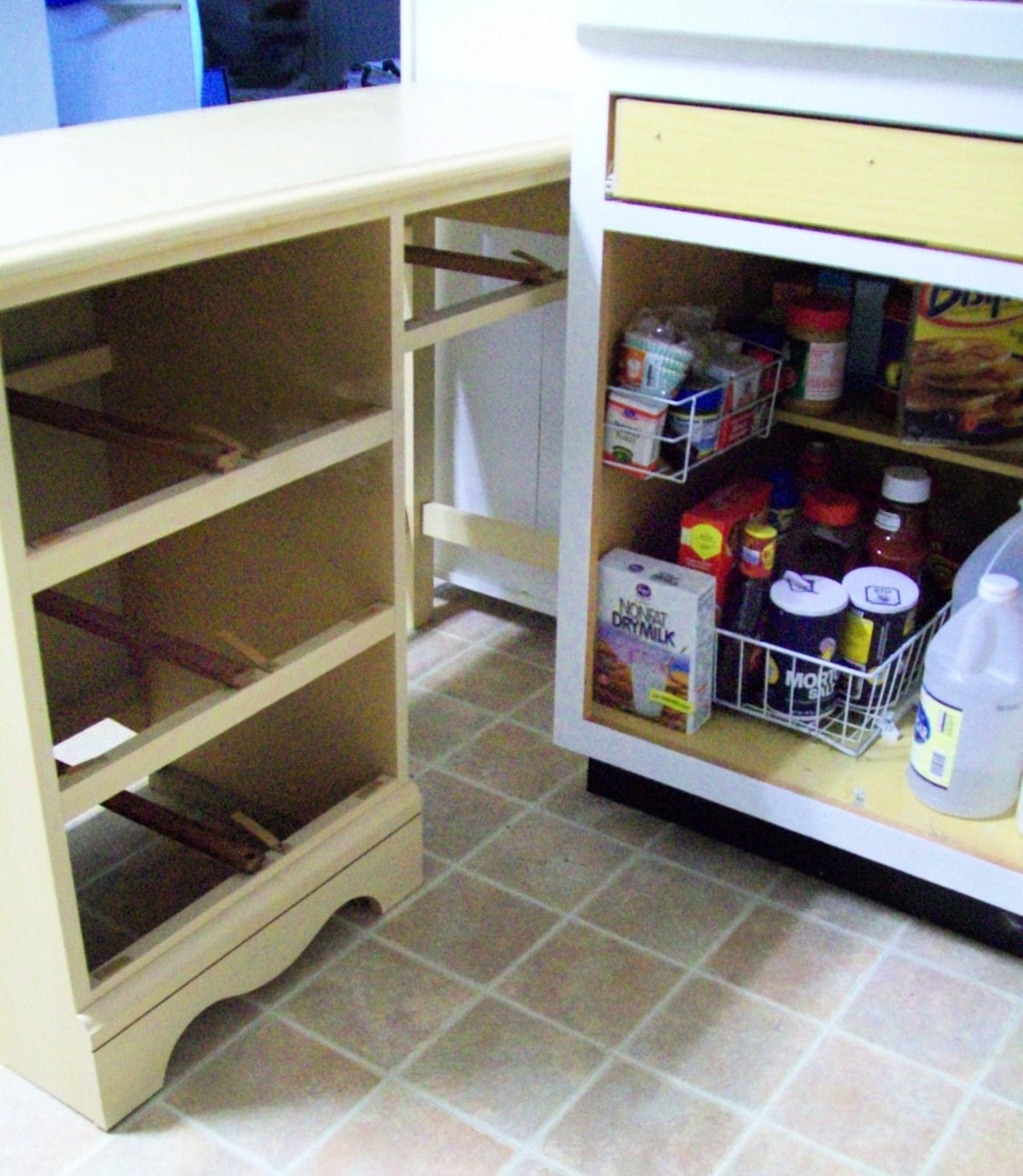 small desk beside kitchen cabinet
