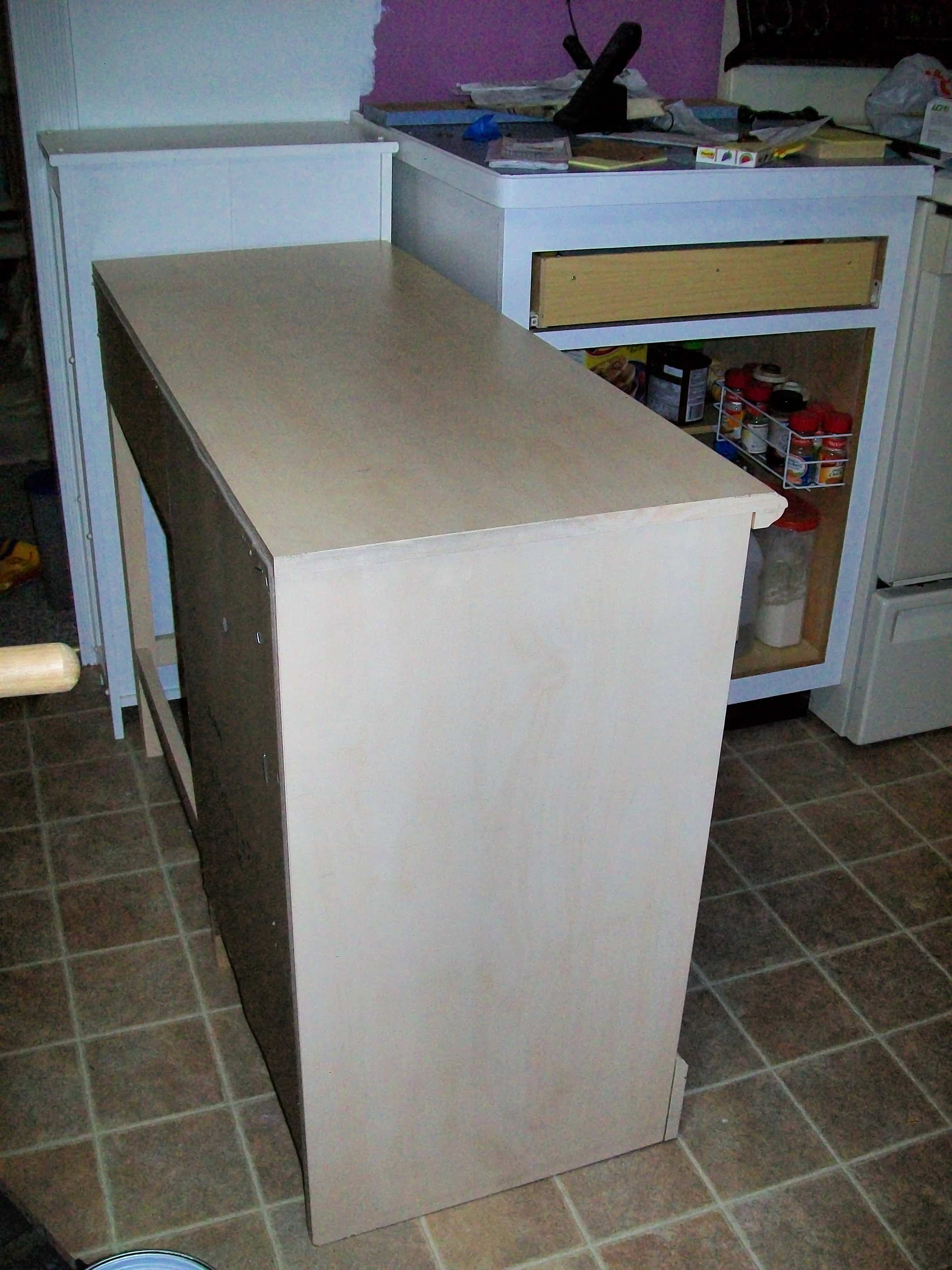 testing small desk as a kitchen island