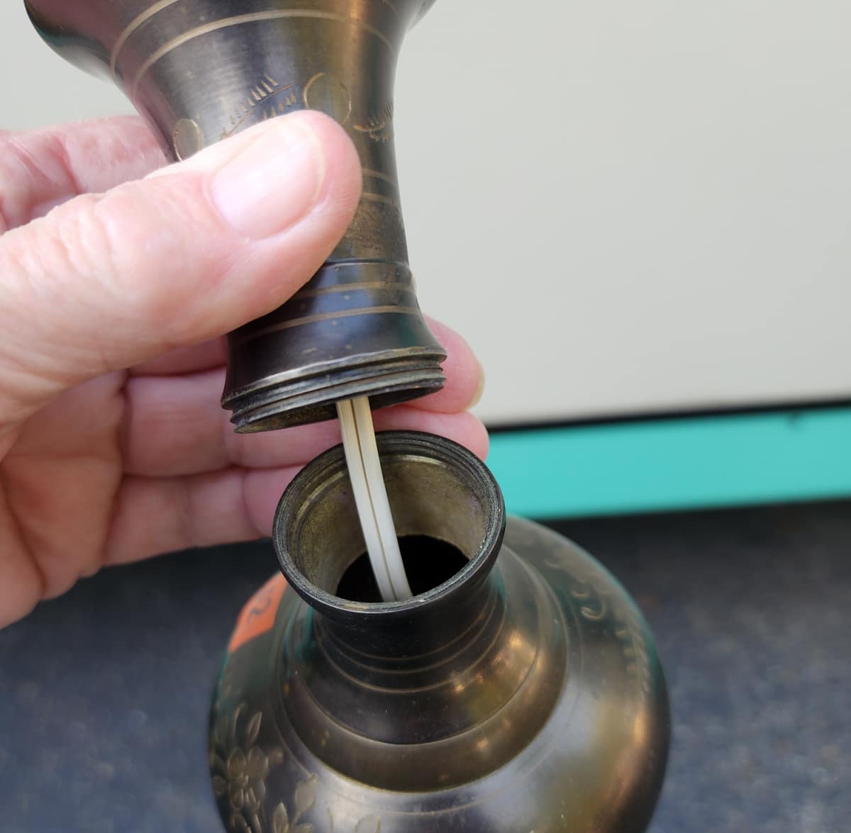 begin dismantling floor lamp