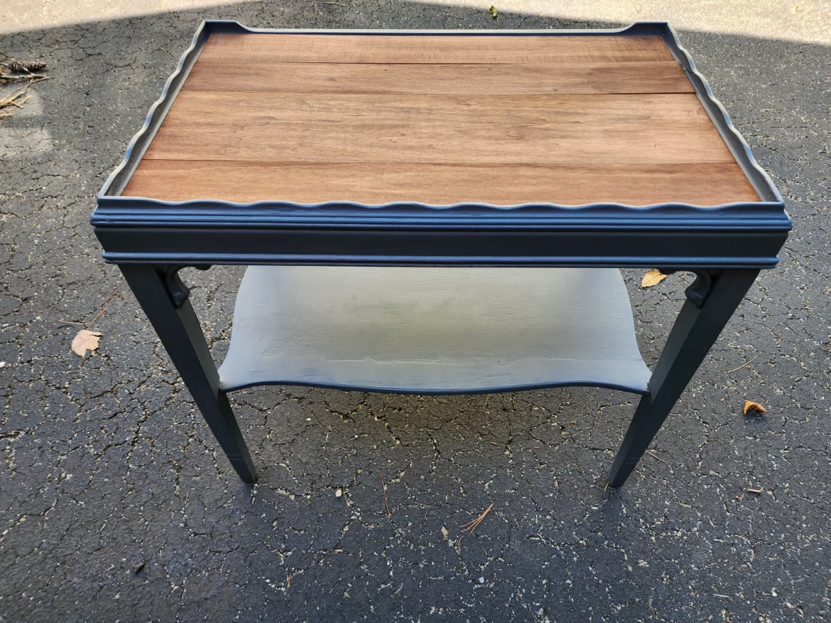 first coat of paint testing the color of the wood slats on the table top