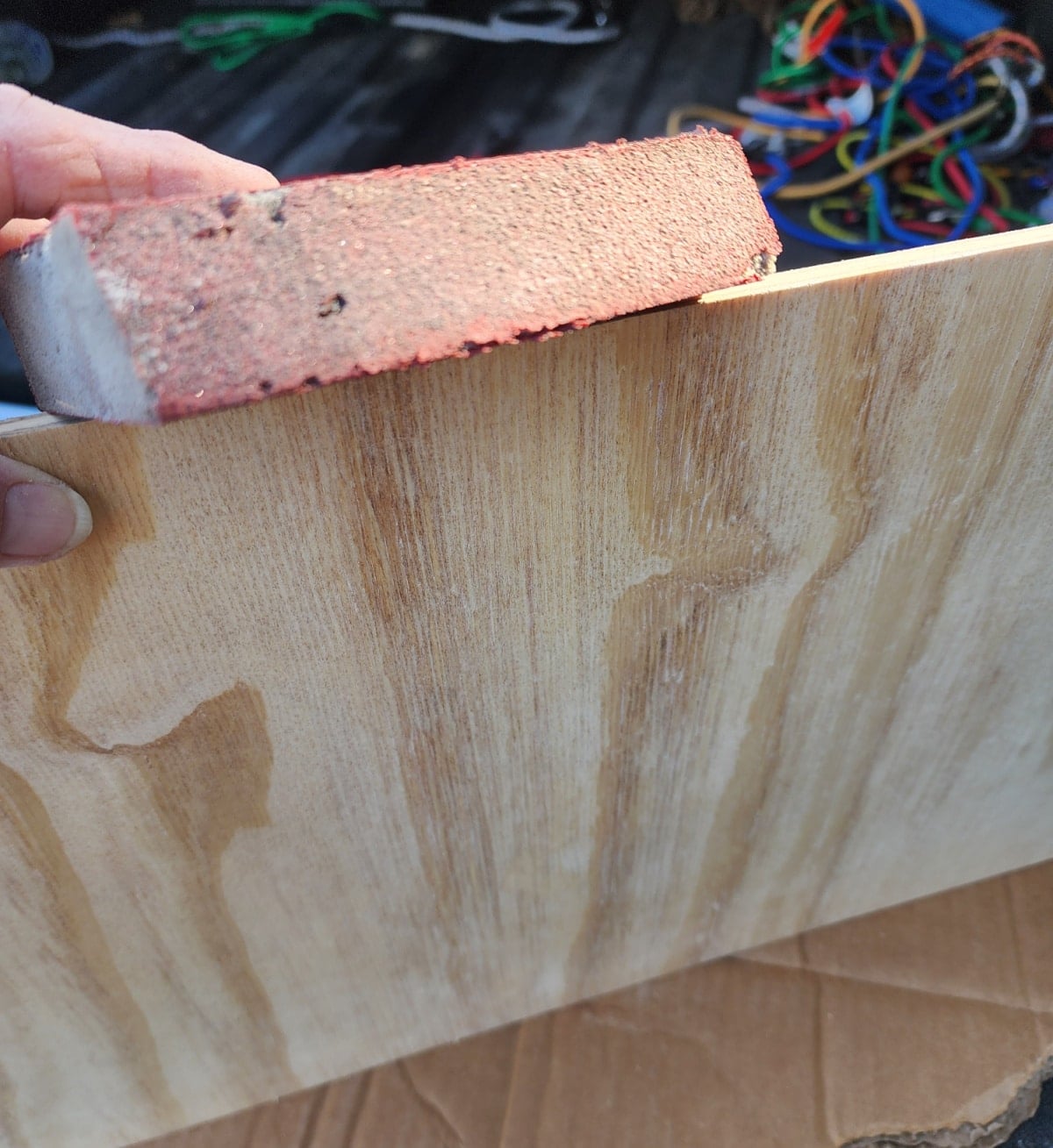 sand raw edges of plywood with a sanding sponge