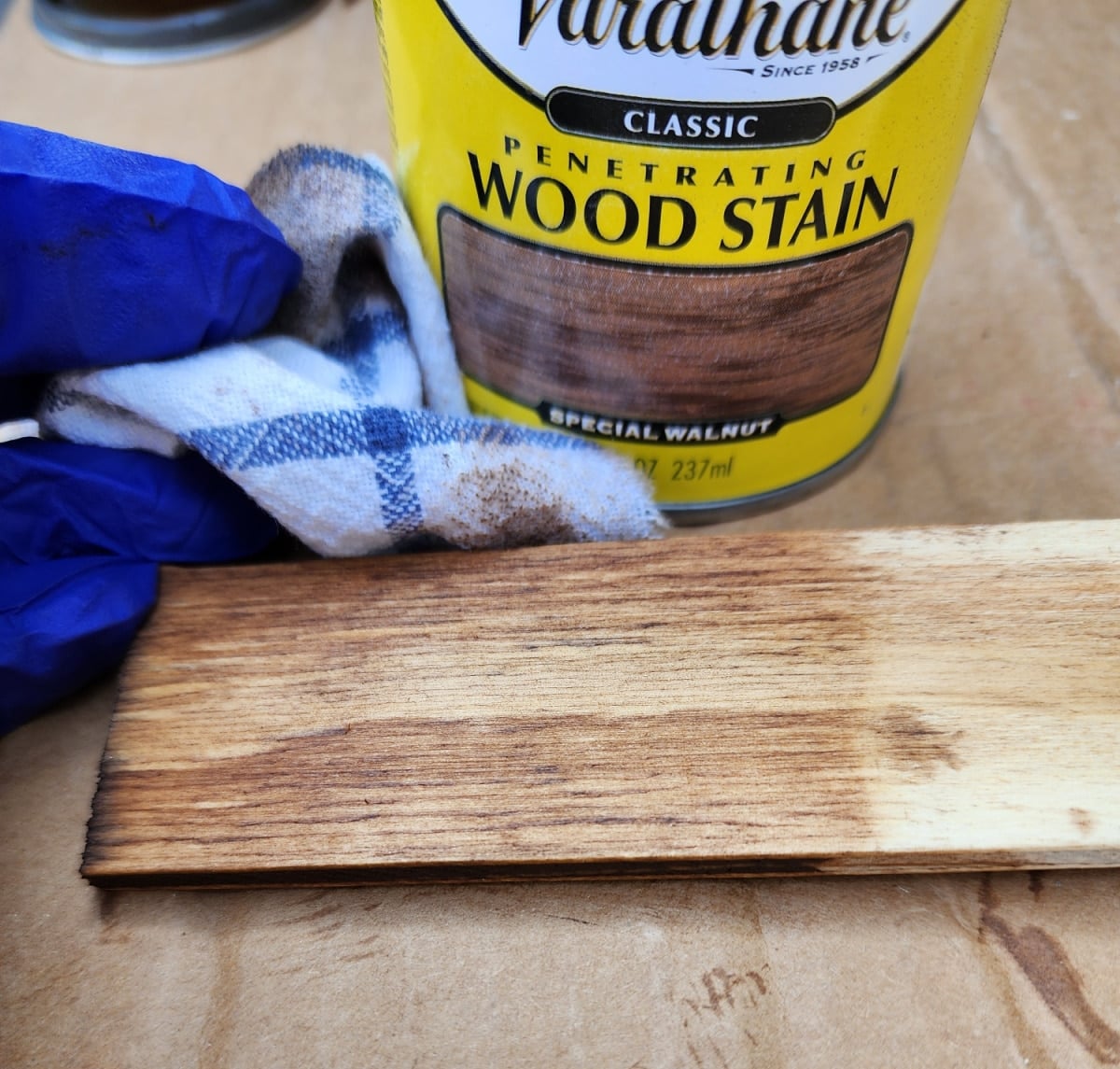 testing the stain color on a scrap piece of plywood