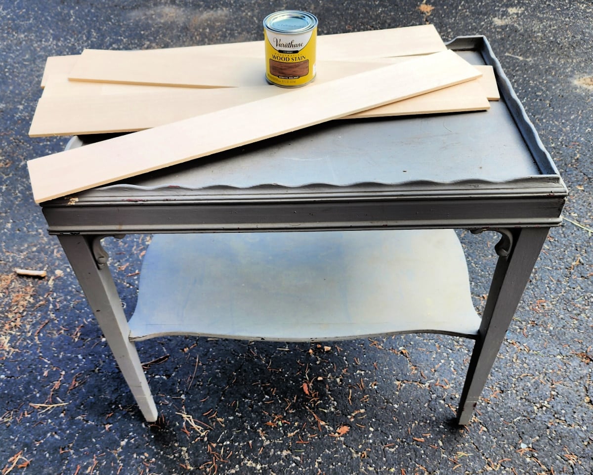 wood slats and special walnut stain sitting on top of a table