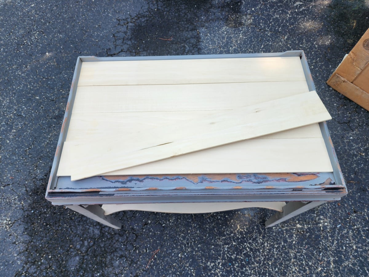 wood slats resting on top of a small side table