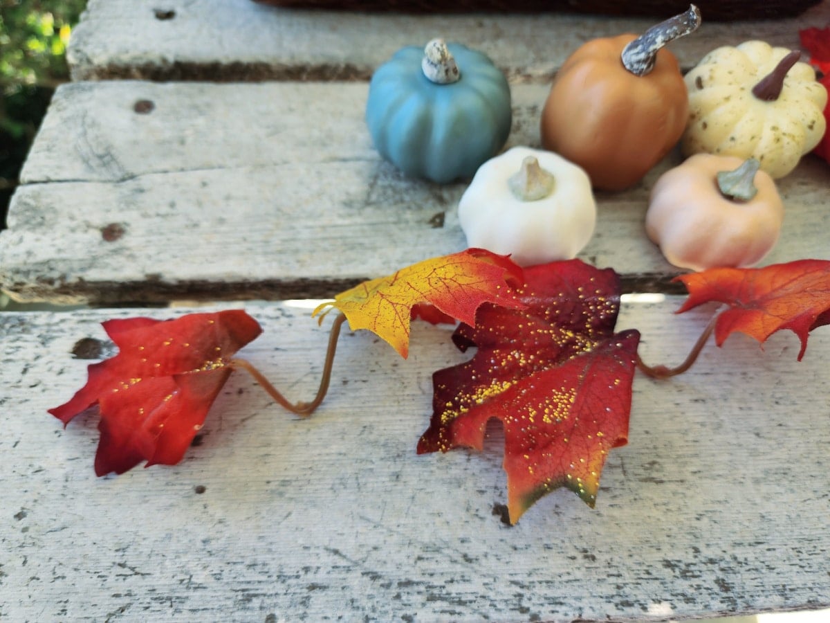 dismantle branches of faux fall foilage